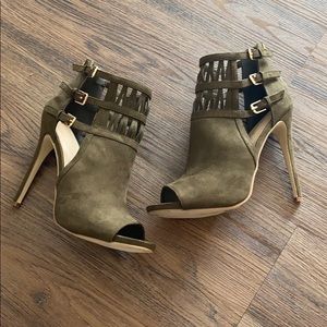 Olive green heels with gold buckles and zipper